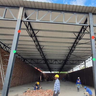 Prism Construction Team Installing Roofing Structure